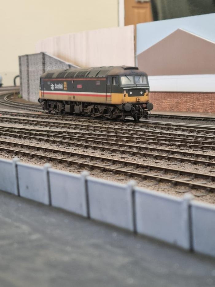 A Heljan Class 47 creeps through the trackwork testing the new formation.