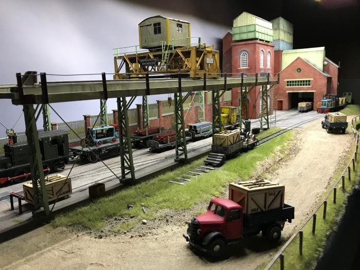 The Yard features working trains, crane and road vehicles in 7mm scale.
