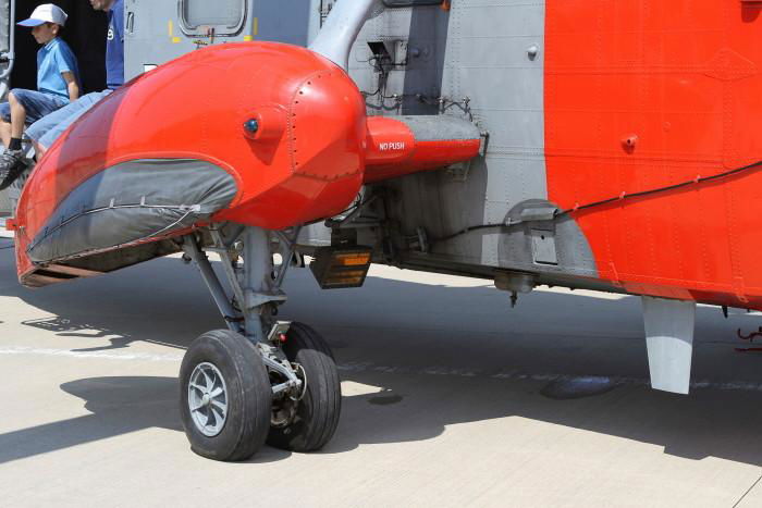 The main undercarriage retracts into sponsons on each side, with a Brightstar infrared search and landing light mounted under the right-hand stub wing.