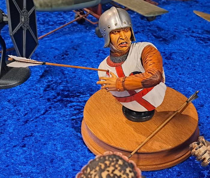Above: Washington Model Club member Darryl Clark painted this Verlinden 1/5 scale English Longbowman ca 1450 bust, capturing the skin and leather tones most convincingly, but decided to replace the resin fletchings with scratch-built replacements for greater realism.