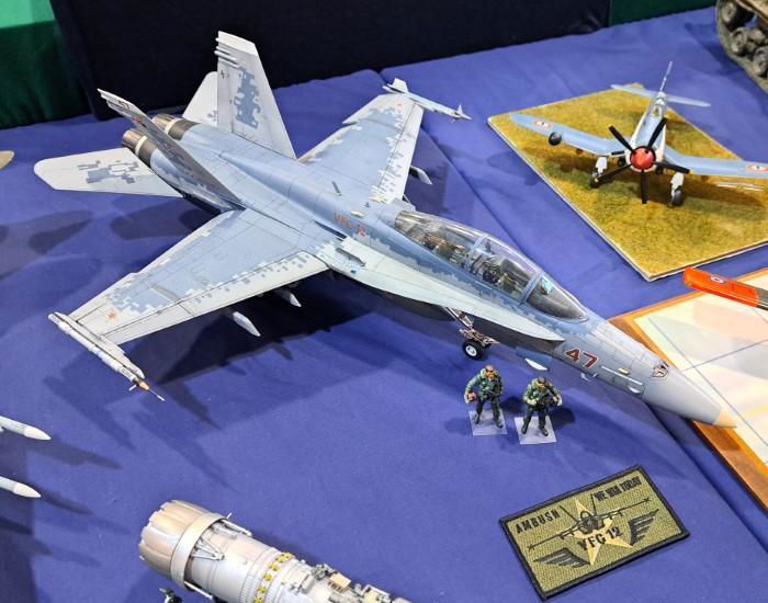 Above: Manchester IPMS modeller David Chase took Academy’s impressive 1/32 F/A-18D Hornet and added Aeromask’s aftermarket spraying templates to recreate the ‘Wet n wild’ digital-style camouflage worn by VFC-12 airframe Red 47, before adding two crew figures.