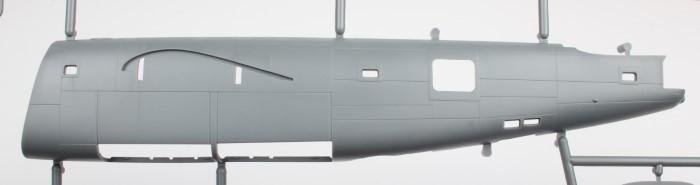 Above: The main fuselage halves comprise just the centre and tail sections; the exterior features engraved panel lines and restrained rivets, including those around all the openings for windows.